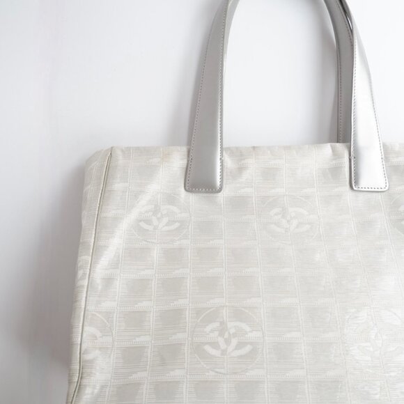 Authentic Preowned Chanel Silver Canvas New Travel Line Tote Bag - Picture 13 of 16